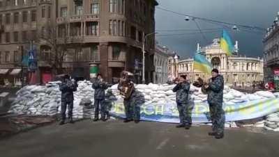 Ukrainian military band plays 'Don't Worry Be Happy' in anticipation of Russian attack in Odessa.