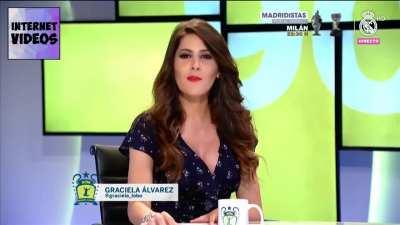 Graciela Alvarez pops a button