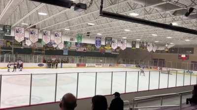My son and the other goalie entertaining themselves during a 5 minute stoppage while the referees figure out the fighting penalties.