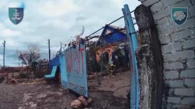 Storming and clearing houses where the enemy has settled. The action takes place under the cover of equipment. Illinka, Donetsk region