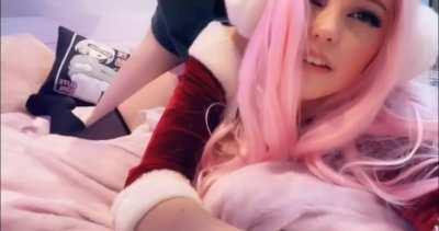 Belle holds the camera