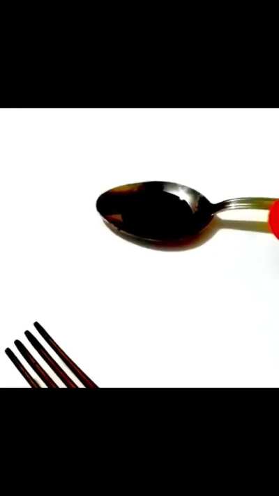 Artist uses forks and scissors to create calligraphy 🤯