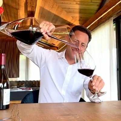 Decanting wine with style. Allows more oxygen exposure.