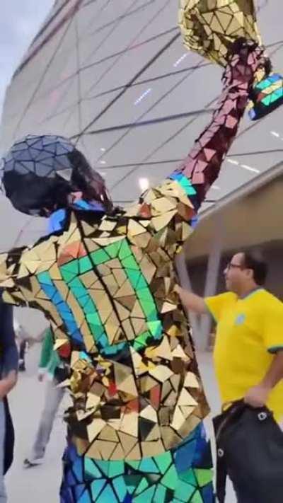 Brazilian football fan covering himself with mirrors