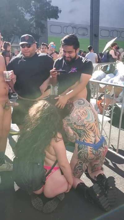 It was so hot seeing these 2 girls sucking off 1 guy at the Folsom Festival.