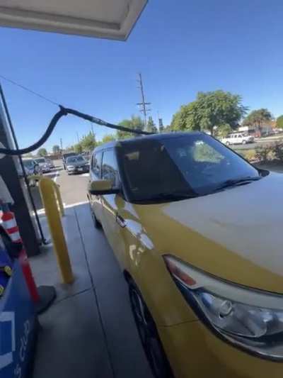 Karen at a gas station