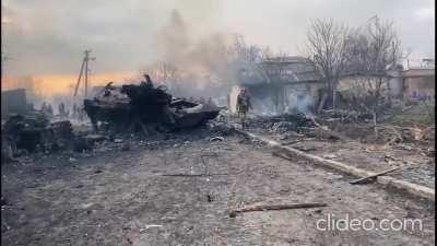 Blown up russian equipment, fire, Ukrainian troops after fierce battle,... and in walks a Ukrainian woman with a Kalashnikov, no helmet, no bullet proof vest, sunglasses, who is fighting with the battalion. ( 