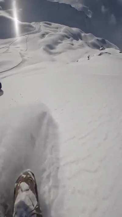 Skiing down this mountain ridge