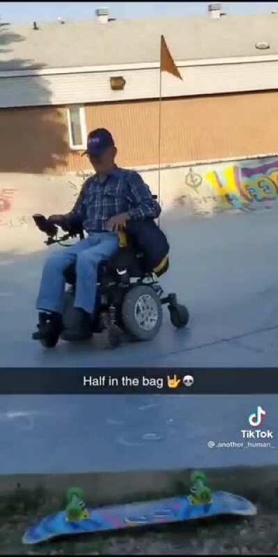 Old drunk man on his scooter sending it at the skatepark