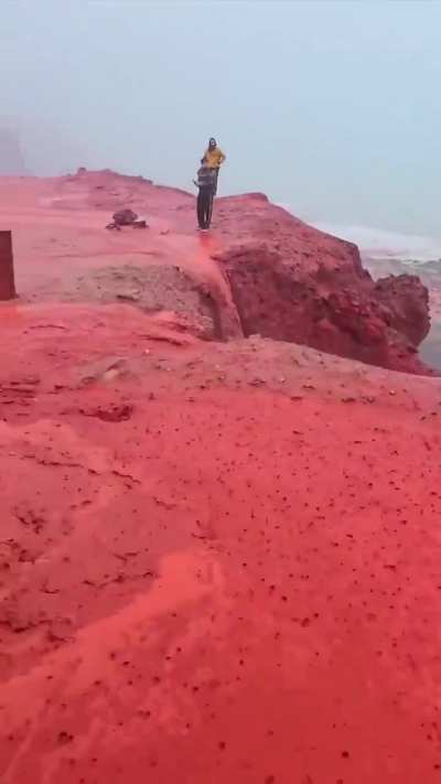 🔥 heavy rain at the red beach at Hormuz Island, Iran.