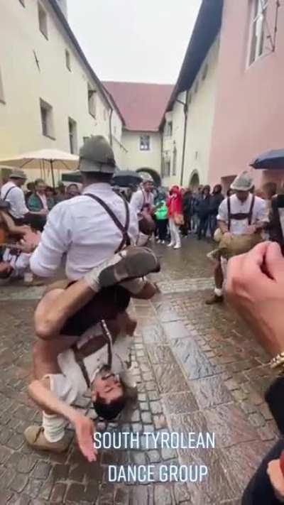 Just guys doing an awesome dance with other dudes.