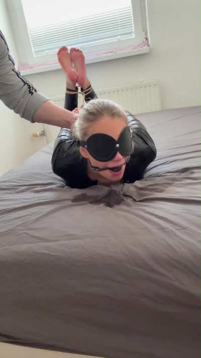 Completely exhausted after hours in a hogtie, face down in my own spit.