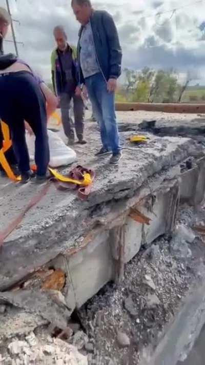 Rescuers saved a dog that fell through the ruins of a bombarded bridge in de-occupied Kupiansk. The pup received a treat upon reaching the surface. Kindness comes in all forms. 🌟