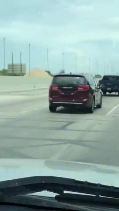 Watch the license plate as the van drives through a toll in Florida