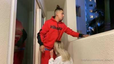 Nina Elle blows dude on balcony & gets caught by neighbors