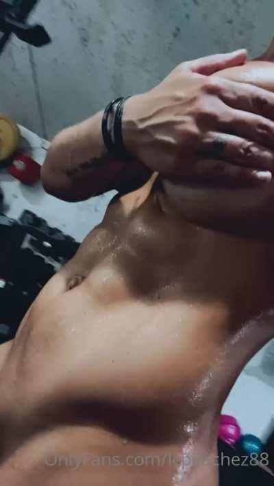 glistening in post workout sweat