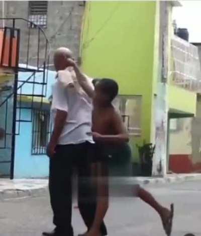 Kid couldn't handle the bald head!