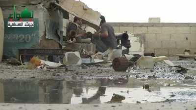 Muslim Army Brigade fighters target multiple SAA vehicles with an SPG-9 in 'Ash Al-Warwar, Damascus (May 2013)