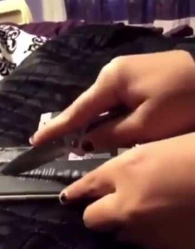 What could go wrong trying to cut a phone battery?