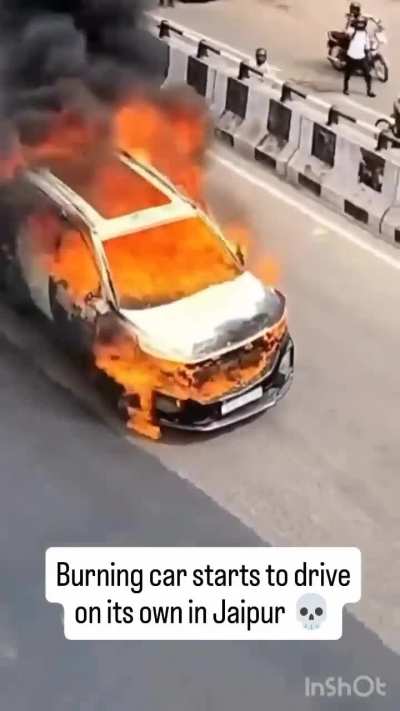 Watching a car burn on a flyover..