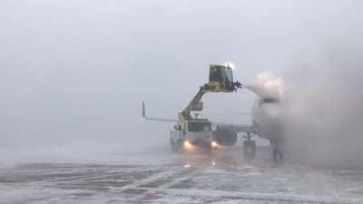 De-icing during a snow squall yesterday at CVG.