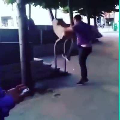Idiot fights trashcan