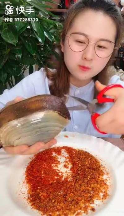 Wtf is this? Is it alive? Why does she slap it like it’s a cock?