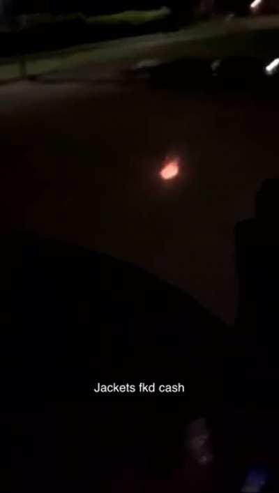 Playing with fireworks on the road.