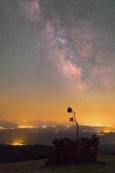Milky Way passing above small villages of Provence
