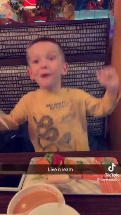 Kid tries wasabi 
