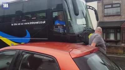 Furious, Milk Dud of a man has an argument with bus driver in the middle of the road, blocking traffic, 