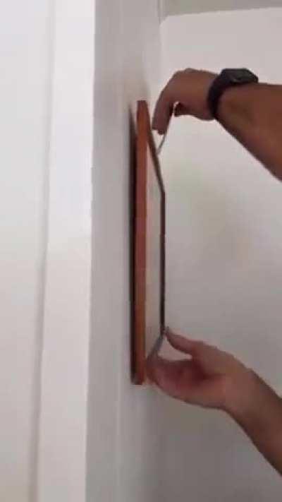 How to use a fork to help hanging pictures much easier