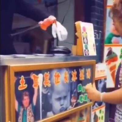 Turkish Ice cream vendor performing the trick WCGW