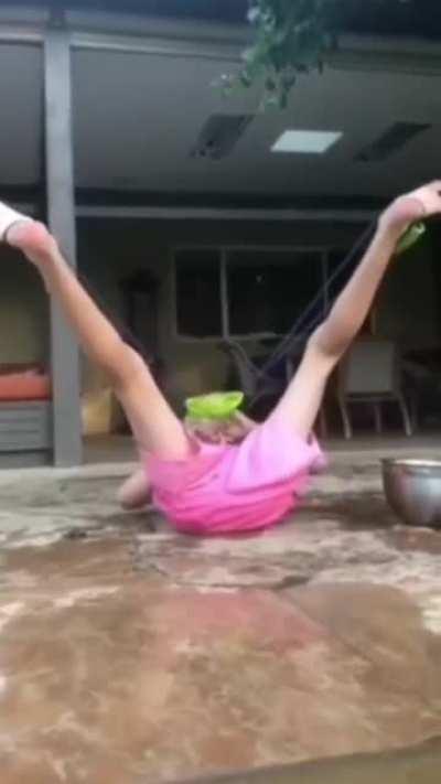 Water balloon foot catapult results in wet nuts