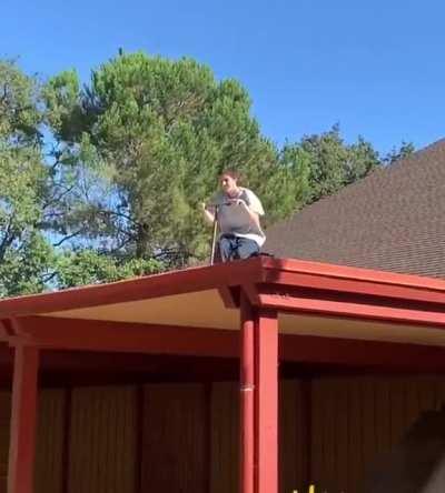 Jumping off the roof on a scooter.