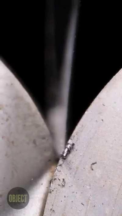 Knife going through a knife sharpener