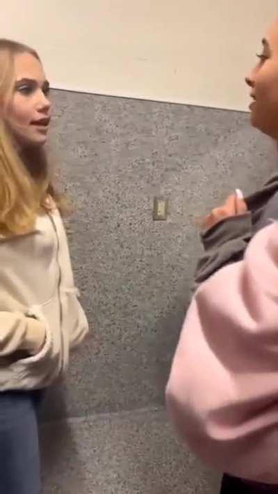 Student completely knocks out another student because her bf cheated on her