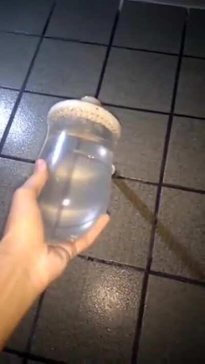 Wcgw putting a condom on a showerhead