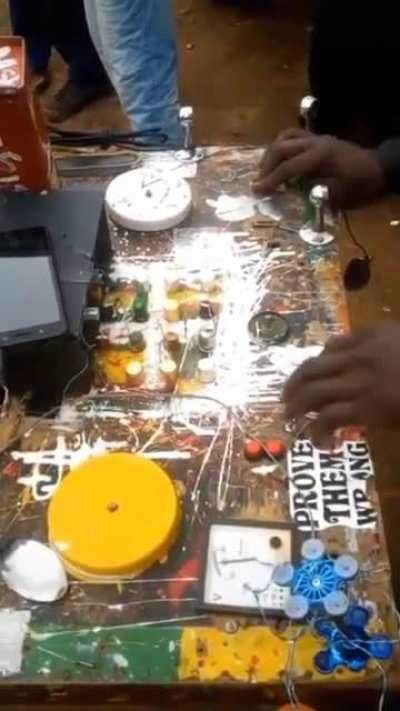 A self-taught Kenyan DJ, DJ Boboss, made a DJ deck out of scrap and electronic waste.