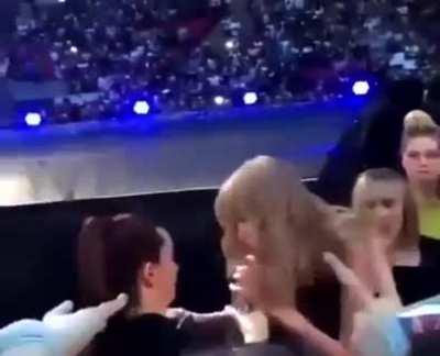 Taylor getting up on stage. look at that bum