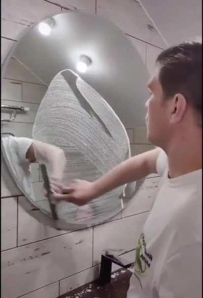 Wiping the mirror