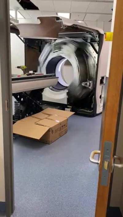 A CT scanner with the housing removed