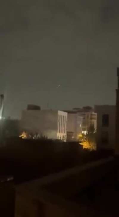 Anti-air guns seen firing into the night sky over the Iranian capital of Tehran.