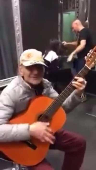 Man makes western sound effects with his mouth.