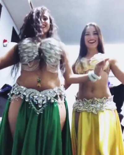 Samira Zopunyan shimmying with her friend