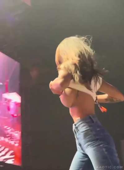 Amazing tits reveal at a concert