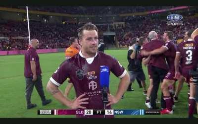 Wayne Bennett celebrating the win with the boys