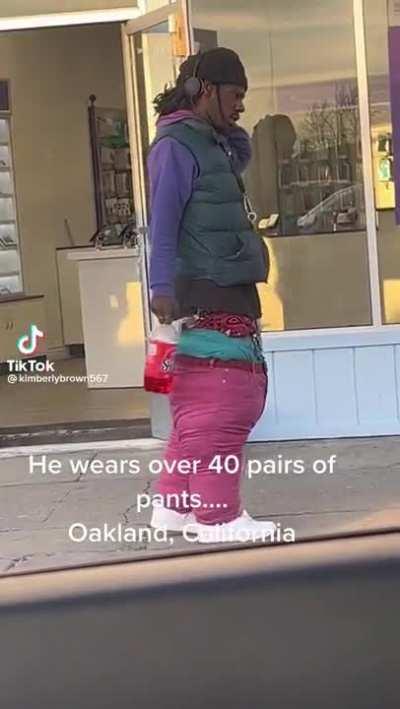 Wearing 4o pairs of pants.