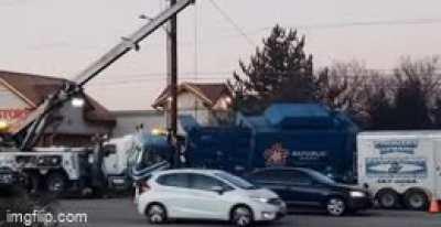 Garbage truck driver was in waayyyy too big of a hurry around a right turn. [OC]