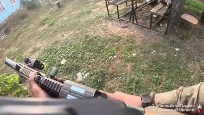 Foreign legionnaires assault a building used by Russian special forces. Village of Lyubymivka, Kursk region.